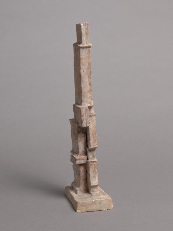 Kleine stehende Figur