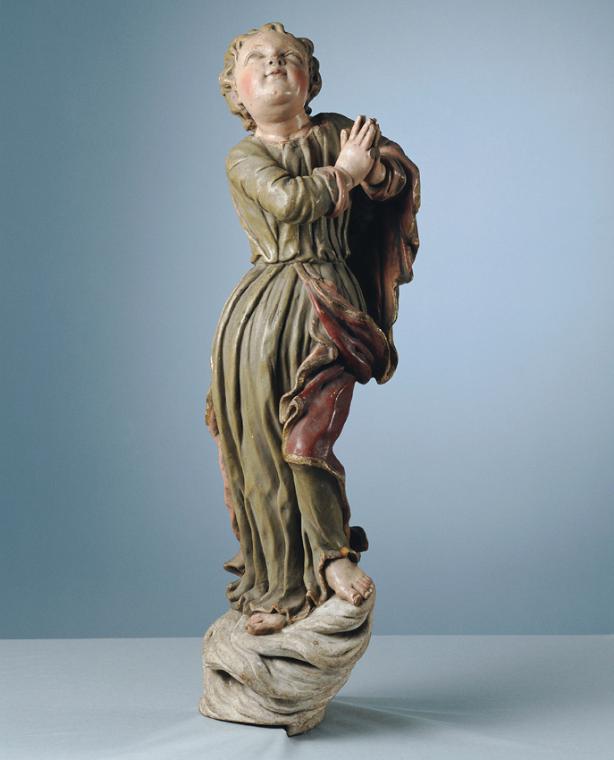 Anbetendes Kind, auf Wolken schwebend