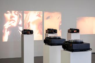 Maria Hahnenkamp, Diaprojektion 4a (Mode-Porno-Porno (Extase)), 2002, Dreifachprojektion; je Se…