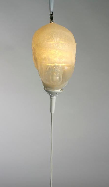 Fatima Bornemissza, Lichtkopf, undated, Mischtechnik (Silikon, Bandagen, Lampe), 87 × 17 × 12 c…