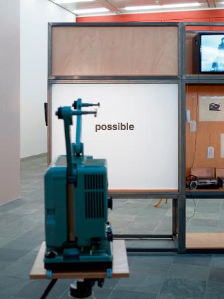 Peter Weibel, Possible, 1969/2014, Filmprojektor, Klebebuchstaben, Projektor: 166 × 102 × 90 cm…